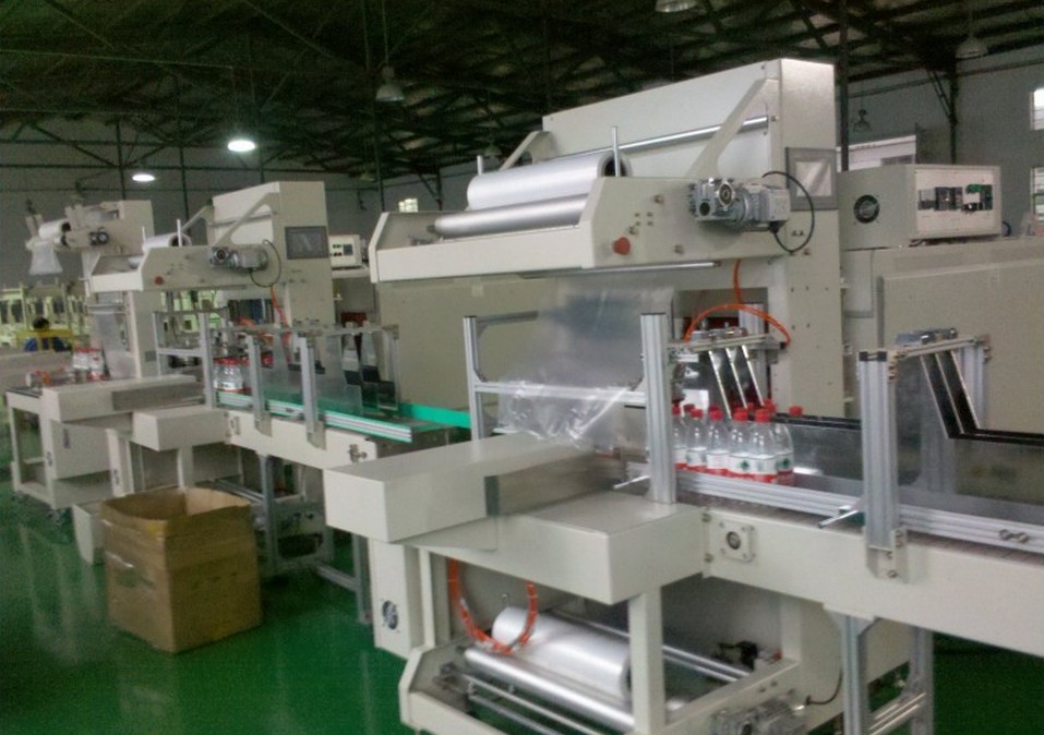 the machines used in factory shrink packing.jpg