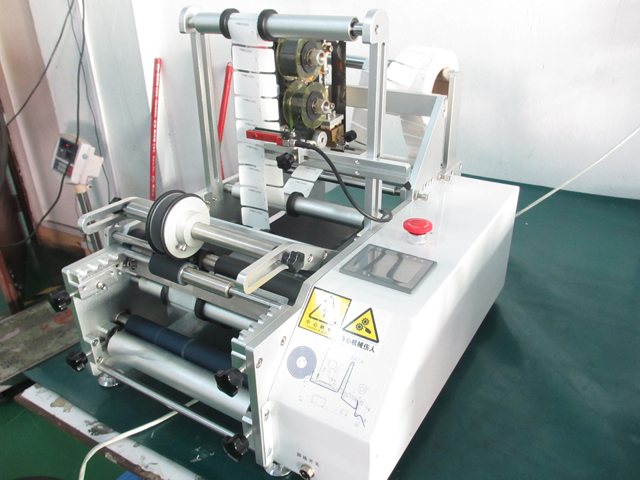 syringe labeling machinery with expiry date.jpg