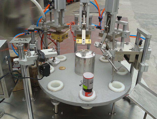 tubes filling sealing semi automatic.jpg