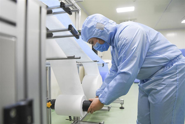 face masks making in factory.jpg